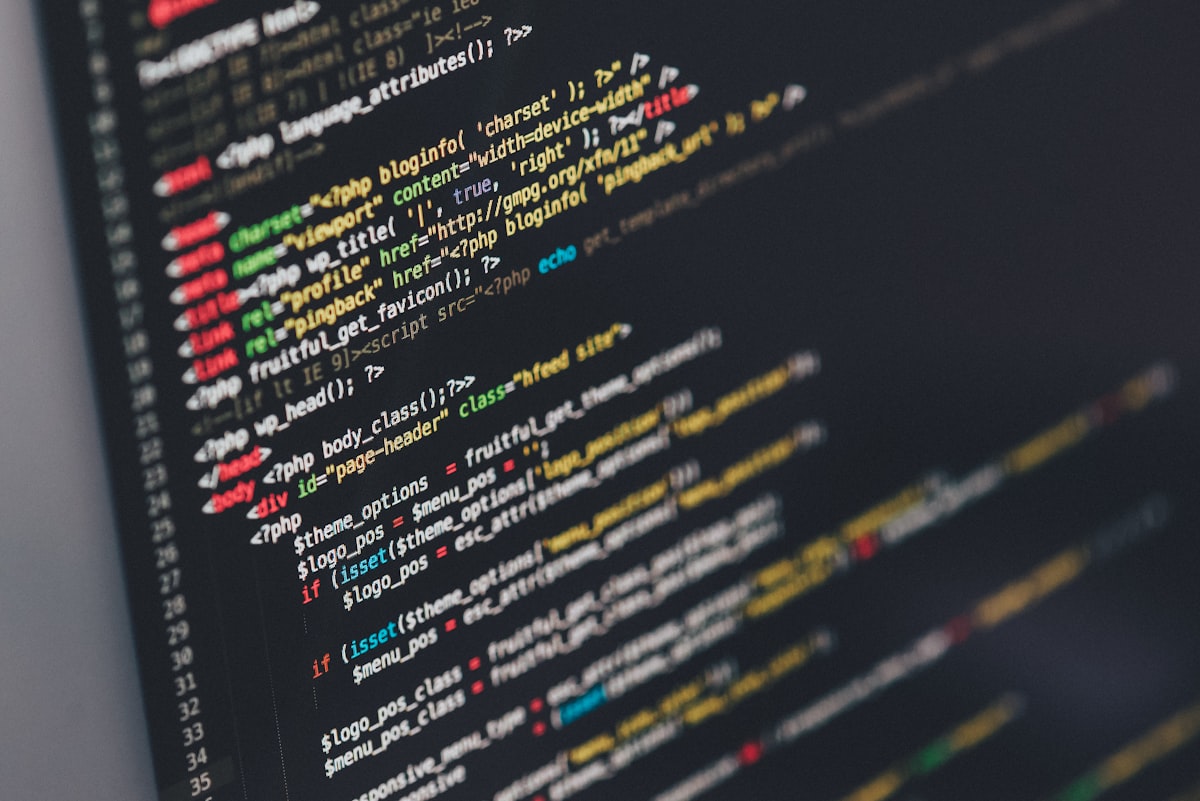 Close-up of colorful code on a computer screen